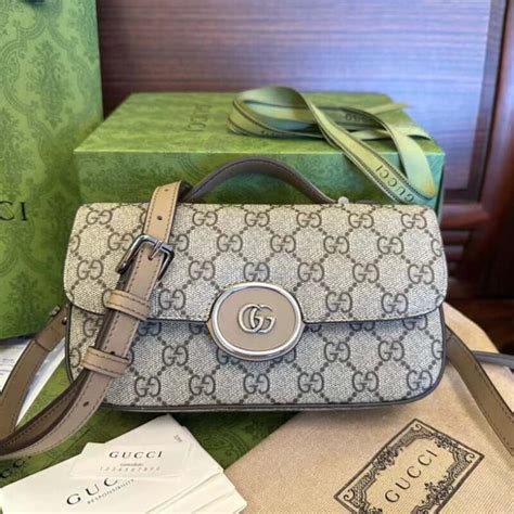 gucci 739722|Petite GG mini shoulder bag in GG Supreme .